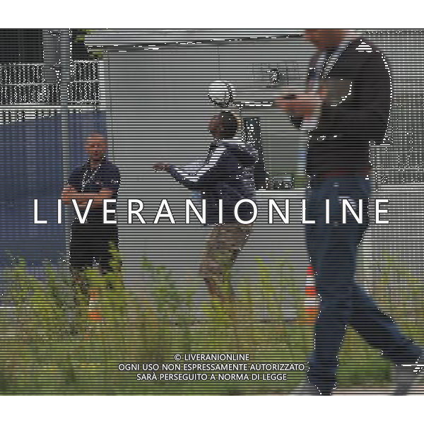 !!!UWAGA PAPARAZZI!!! BRAK ZGODY NA PUBLIKACJE. AUTOR NIE PONOSI ODPOWIEDZIALNOSCI ZA SKUTKI PRAWNE ZWIAZANE Z PUBLIKACJA. KRAKOW 26.06.2012 MLODSZY BRAT MARIO BALOTELLI ENOCH BALOTELII W CZASIE TRENINGU REPREZENTACJI WLOCHY PRZED STADIONIEM CRACOVIA KRAKOW KAPKOWAL Z OCHRONIARZEM. ZROBIL SOBIE TEZ PAMIATKOWE ZDJECIE Z POLICJA. NA SAM KONIEC UCIEKAL PRZED PAPARAZZI. N Z ENOCH BALOTELLI KAPKUJE Z FUNCKJONARIUSZEM OCHRONY FOT. JAKUB GRUCA/ TOMASZ JAGODZINSKI/ NEWSPIX.PL --- Newspix.pl Little Brother Enoch BALOTELII Mario Balotelli during training REPRESENTATION FROM ITALY Cracovia Krakow stadium played ball with the bodyguard. DO a commemorative picture with the police. At the end I was running away from paparazzi. ENOCH BALOTELLI FRATELLO DI MARIO BALOTELLI GIOCA A CALCIO CON LA POLIZIA IN POLONIA NEL RITIRO DELL\'ITALIA PH.AG ALDO LIVERANI SAS - ITALY ONLY - *** Local Caption *** www.newspix.pl mail us: info@newspix.pl call us: 0048 022 23 22 222 --- Polish Picture Agency by Ringier Axel Springer Poland