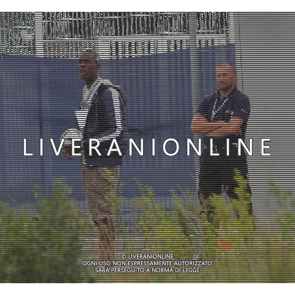 !!!UWAGA PAPARAZZI!!! BRAK ZGODY NA PUBLIKACJE. AUTOR NIE PONOSI ODPOWIEDZIALNOSCI ZA SKUTKI PRAWNE ZWIAZANE Z PUBLIKACJA. KRAKOW 26.06.2012 MLODSZY BRAT MARIO BALOTELLI ENOCH BALOTELII W CZASIE TRENINGU REPREZENTACJI WLOCHY PRZED STADIONIEM CRACOVIA KRAKOW KAPKOWAL Z OCHRONIARZEM. ZROBIL SOBIE TEZ PAMIATKOWE ZDJECIE Z POLICJA. NA SAM KONIEC UCIEKAL PRZED PAPARAZZI. N Z ENOCH BALOTELLI KAPKUJE Z FUNCKJONARIUSZEM OCHRONY FOT. JAKUB GRUCA/ TOMASZ JAGODZINSKI/ NEWSPIX.PL --- Newspix.pl Little Brother Enoch BALOTELII Mario Balotelli during training REPRESENTATION FROM ITALY Cracovia Krakow stadium played ball with the bodyguard. DO a commemorative picture with the police. At the end I was running away from paparazzi. ENOCH BALOTELLI FRATELLO DI MARIO BALOTELLI GIOCA A CALCIO CON LA POLIZIA IN POLONIA NEL RITIRO DELL\'ITALIA PH.AG ALDO LIVERANI SAS - ITALY ONLY - *** Local Caption *** www.newspix.pl mail us: info@newspix.pl call us: 0048 022 23 22 222 --- Polish Picture Agency by Ringier Axel Springer Poland