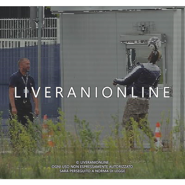 !!!UWAGA PAPARAZZI!!! BRAK ZGODY NA PUBLIKACJE. AUTOR NIE PONOSI ODPOWIEDZIALNOSCI ZA SKUTKI PRAWNE ZWIAZANE Z PUBLIKACJA. KRAKOW 26.06.2012 MLODSZY BRAT MARIO BALOTELLI ENOCH BALOTELII W CZASIE TRENINGU REPREZENTACJI WLOCHY PRZED STADIONIEM CRACOVIA KRAKOW KAPKOWAL Z OCHRONIARZEM. ZROBIL SOBIE TEZ PAMIATKOWE ZDJECIE Z POLICJA. NA SAM KONIEC UCIEKAL PRZED PAPARAZZI. N Z ENOCH BALOTELLI KAPKUJE Z FUNCKJONARIUSZEM OCHRONY FOT. JAKUB GRUCA/ TOMASZ JAGODZINSKI/ NEWSPIX.PL --- Newspix.pl Little Brother Enoch BALOTELII Mario Balotelli during training REPRESENTATION FROM ITALY Cracovia Krakow stadium played ball with the bodyguard. DO a commemorative picture with the police. At the end I was running away from paparazzi. ENOCH BALOTELLI FRATELLO DI MARIO BALOTELLI GIOCA A CALCIO CON LA POLIZIA IN POLONIA NEL RITIRO DELL\'ITALIA PH.AG ALDO LIVERANI SAS - ITALY ONLY - *** Local Caption *** www.newspix.pl mail us: info@newspix.pl call us: 0048 022 23 22 222 --- Polish Picture Agency by Ringier Axel Springer Poland