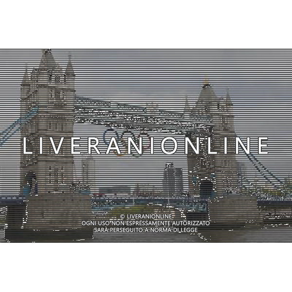 Giant set of Olympic rings are displayed from Tower Bridge on June 27, 2012 in London, England. The rings weigh over three tonnes and measure over 25 metres wide by 11.5 metres tall; they will be illuminated in a light-show every evening during the Games. photoshot/AG ALDO LIVERANI SA - ITALY ONLY - *** Local Caption *** .