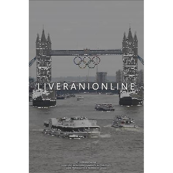 Giant set of Olympic rings are displayed from Tower Bridge on June 27, 2012 in London, England. The rings weigh over three tonnes and measure over 25 metres wide by 11.5 metres tall; they will be illuminated in a light-show every evening during the Games. photoshot/AG ALDO LIVERANI SA - ITALY ONLY - *** Local Caption *** .