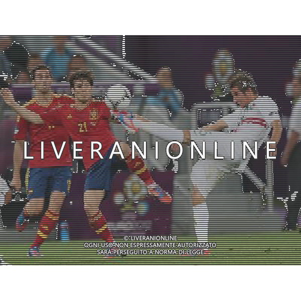 (120628) -- DONETSK, June 28, 2012 () -- Fabio Coentrao (R) competes during the semifinal match between Spain and Portugal at the Euro 2012 football championships in Donetsk, Ukraine, June 27, 2012. (/Meng Yongmin) (jyc) photoshot/AG ALDO LIVERANI SA - ITALY ONLY - *** Local Caption *** .