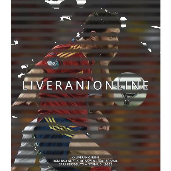 (120628) -- DONETSK, June 28, 2012 () -- Xabi Alonso (Front) of Spain vies with Joao Pereira of Portugal during the semifinal match between Spain and Portugal at the Euro 2012 football championships in Donetsk, Ukraine, June 27, 2012. (/Li Jundong) (jyc) photoshot/AG ALDO LIVERANI SA - ITALY ONLY - *** Local Caption *** .