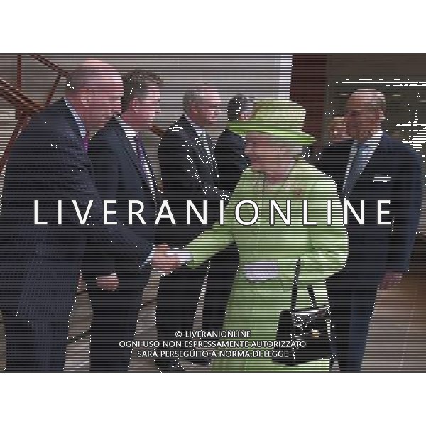 Queen Elizabeth II shakes hands with Peter Sheridan from Co-operation Ireland as the Duke of Edinburgh meets Northern Ireland Deputy First Minister Martin McGuinness (centre) at the Lyric Theatre in Belfast. ©PHOTOSHOT/AG ALDO LIVERANI SAS - ITALY ONLY - 