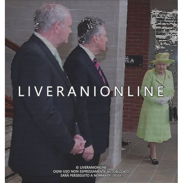 Queen Elizabeth II arrives to meet Northern Ireland First Minister Peter Robinson (centre) and Deputy First Minister Martin McGuinness (left) at the Lyric Theatre in Belfast. ©PHOTOSHOT/AG ALDO LIVERANI SAS - ITALY ONLY - 