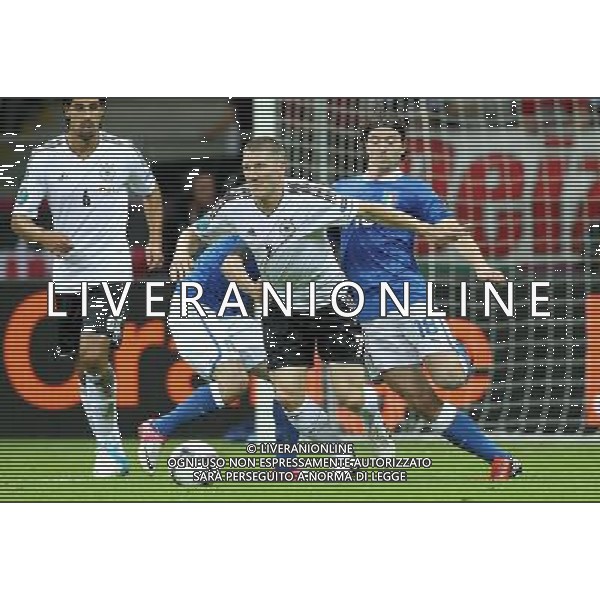 WARSZAWA 28/06/2012 STADION NARODOWY 2012 PILKA NOZNA EURO 2012 POLFINAL MECZ NIEMCY WLOCHY WARSAW NATIONAL STADIUM FOOTBALL EURO 2012 SEMI FINAL MATCH GERMANY ITALY N/Z (L) CLAUDIO MARCISIO BASTIAN ACHWAEINSTEIGER RICCARDO MONTOLIVO FOTO KAMIL KRASZEWSKI APPA --- Newspix.pl EUROPEI 2012 GERMANIA ITALIA AG ALDO LIVERANI SAS - ITALY ONLY - *** Local Caption *** www.newspix.pl mail us: info@newspix.pl call us: 0048 022 23 22 222 --- Polish Picture Agency by Ringier Axel Springer Poland