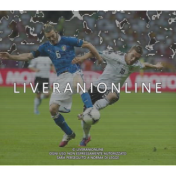 WARSZAWA 28- 06- 2012 STADION NARODOWY PRZY AL KSIECIA J PONIATOWSKIEGO 1 ARENA EURO 2012 MECZ NR 30 POLFINAL EURO 2012 NIEMCY v WLOCHY NZ FEDERICO BALZARETTI - LUKASZ PODOLSKI FOT KRYSTYNA PACZKOWSKA/NEWSPIX.PL NATIONAL STADIUM WARSAW AT AL KSIECIA J PONIATOWSKIEGO 1 MATCH 30 OF EURO 2012 SEMI FINAL GERMANY v ITALY --- Newspix.pl EUROPEI 2012 GERMANIA ITALIA AG ALDO LIVERANI SAS - ITALY ONLY - *** Local Caption *** www.newspix.pl mail us: info@newspix.pl call us: 0048 022 23 22 222 --- Polish Picture Agency by Ringier Axel Springer Poland