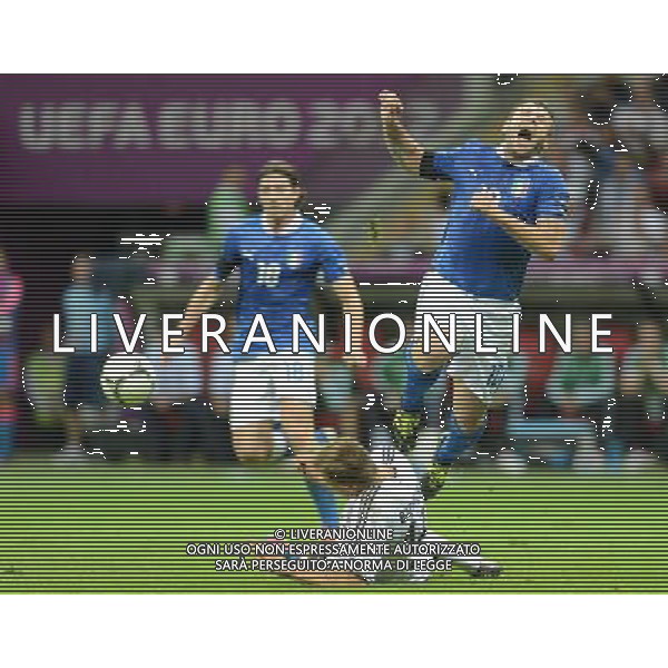 (120629) -- WARSAW, June 29, 2012 () -- Antonio Cassano (R) of Italy vies with Holger Badstuber (Down) of Germany during the semifinal match between Germany and Italy at the Euro 2012 football championships in Warsaw, Poland, June 28, 2012. (/Ma Ning) (jyc) PHOTOSHOT/AG ALDO LIVERANI SAS - ITALY ONLY -