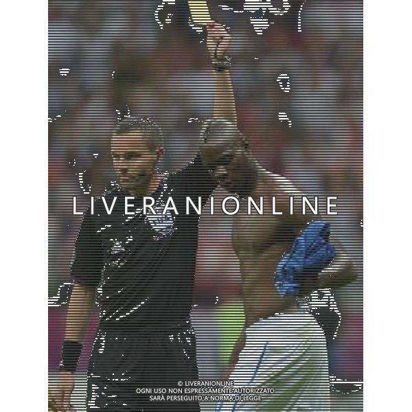 (120629) -- WARSAW, June 29, 2012 () -- Mario Balotelli (R) of Italy receives a yellow card during the semifinal match between Germany and Italy at the Euro 2012 football championships in Warsaw, Poland, June 28, 2012. (/Ma Ning) (jyc) PHOTOSHOT/AG ALDO LIVERANI SAS - ITALY ONLY -