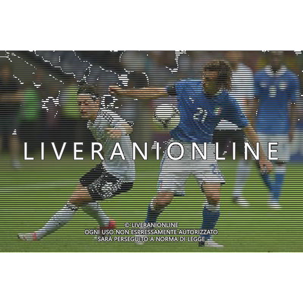 (120629) -- WARSAW, June 29, 2012 () -- Andrea Pirlo (R) of Italy vies with Mesut Oezil of Germany during the semifinal match between Germany and Italy at the Euro 2012 football championships in Warsaw, Poland, June 28, 2012. (/Liu Lihang) (jyc) PHOTOSHOT/AG ALDO LIVERANI SAS - ITALY ONLY -