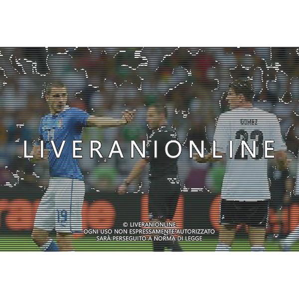 (120629) -- WARSAW, June 29, 2012 () -- Mario Gomez (R) of Germany and Leonardo Bonucci of Italy react during the semifinal match between Germany and Italy at the Euro 2012 football championships in Warsaw, Poland, June 28, 2012. (/Liu Lihang) (jyc) PHOTOSHOT/AG ALDO LIVERANI SAS - ITALY ONLY -