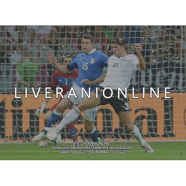 (120629) -- WARSAW, June 29, 2012 () -- Mario Gomez (R) of Germany vies with Andrea Barzagli of Italy during the semifinal match between Germany and Italy at the Euro 2012 football championships in Warsaw, Poland, June 28, 2012. (/Ma Ning) (jyc) PHOTOSHOT/AG ALDO LIVERANI SAS - ITALY ONLY -