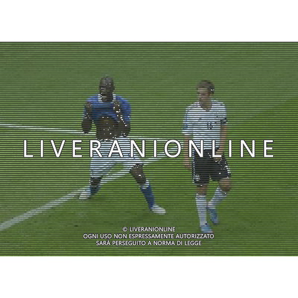 (120629) -- WARSAW, June 29, 2012 () -- Mario Balotelli (L) of Italy celebrates after scoring during the semifinal match between Germany and Italy at the Euro 2012 football championships in Warsaw, Poland, June 28, 2012. (/Wu Wei) (jyc) PHOTOSHOT/AG ALDO LIVERANI SAS - ITALY ONLY -