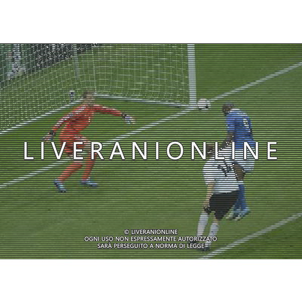 (120629) -- WARSAW, June 29, 2012 () -- Mario Balotelli (R) of Italy scores during the semifinal match between Germany and Italy at the Euro 2012 football championships in Warsaw, Poland, June 28, 2012. (/Wu Wei) (jyc) PHOTOSHOT/AG ALDO LIVERANI SAS - ITALY ONLY -