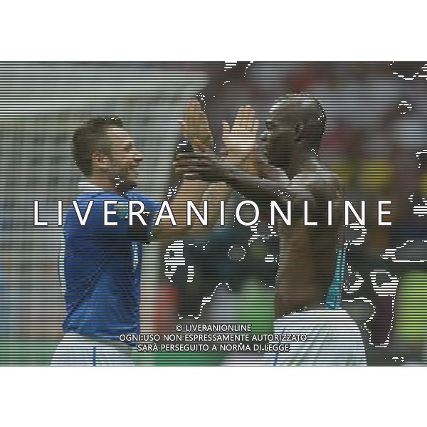 (120629) -- WARSAW, June 29, 2012 () -- Mario Balotelli (R) of Italy celebrates after scoring with his teammate Antonio Cassano during the semifinal match between Germany and Italy at the Euro 2012 football championships in Warsaw, Poland, June 28, 2012. (/Ma Ning) (jyc) PHOTOSHOT/AG ALDO LIVERANI SAS - ITALY ONLY -