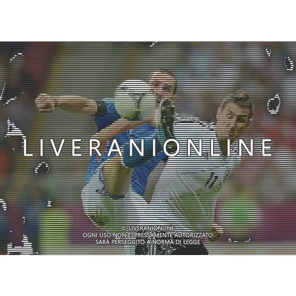 (120629) -- WARSAW, June 29, 2012 () -- Leonardo Bonucci (L) of Italy vies with Miroslav Klose of Germany during the semifinal match between Germany and Italy at the Euro 2012 football championships in Warsaw, Poland, June 28, 2012. Italy won 2-1 to enter the final. (/Ma Ning) (jyc) PHOTOSHOT/AG ALDO LIVERANI SAS - ITALY ONLY -