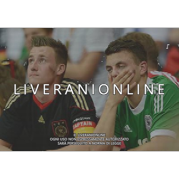 (120629) -- WARSAW, June 29, 2012 () -- Fans of Germany react after the semifinal match between Germany and Italy at the Euro 2012 football championships in Warsaw, Poland, June 28, 2012. Italy won 2-1 to enter the final. (/Ma Ning) (jyc) PHOTOSHOT/AG ALDO LIVERANI SAS - ITALY ONLY -