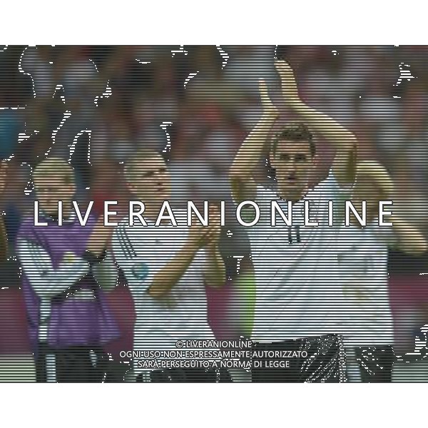 (120629) -- WARSAW, June 29, 2012 () -- Miroslav Klose (R) greets the spectators after the semifinal match between Germany and Italy at the Euro 2012 football championships in Warsaw, Poland, June 28, 2012. Italy won 2-1 to enter the final. (/Ma Ning) (jyc) PHOTOSHOT/AG ALDO LIVERANI SAS - ITALY ONLY -