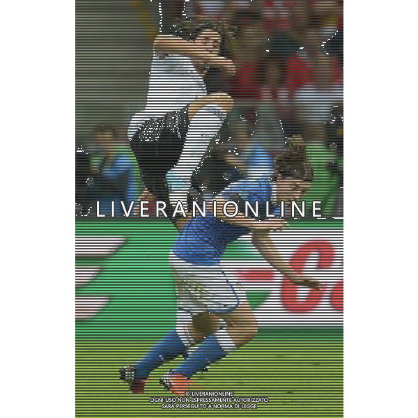 (120629) -- WARSAW, June 29, 2012 () -- Sami Khedira (Up) of Germany vies with Riccardo Montolivo of Italy during the semifinal match between Germany and Italy at the Euro 2012 football championships in Warsaw, Poland, June 28, 2012. Italy won 2-1 to enter the final. (/Liu Lihang) (jyc) PHOTOSHOT/AG ALDO LIVERANI SAS - ITALY ONLY -