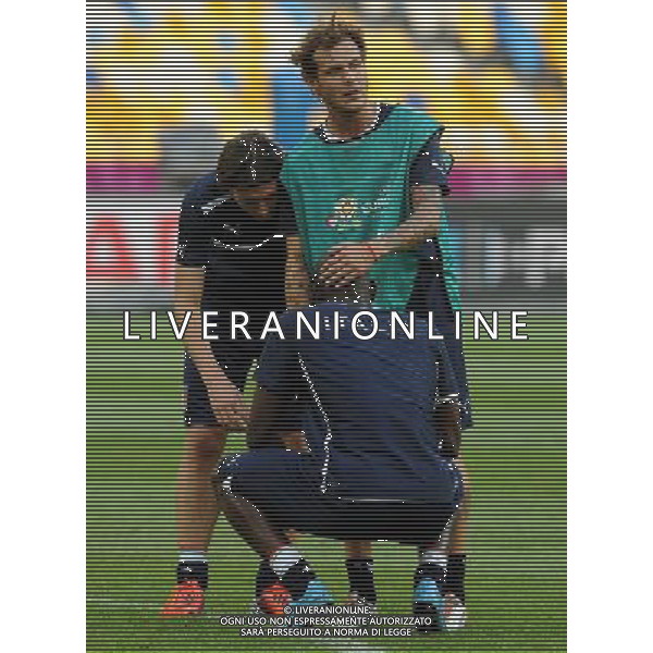 Campionati Europei UEFA 2012 Polonia/Ucraina Finale Kiev (Ucraina) - 30.06.2012 Allenamento Italia Nella Foto:diamanti e montolivo consolano balotelli /Ph.Vitez-Ag. Aldo Liverani