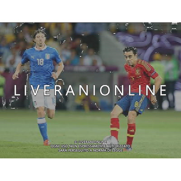 KIJOW STADION OLIMPIJSKI 01.07.2012 EURO 2012 PILKA NOZNA FINAL MISTRZOSTW EUROPY HISZPANIA WLOCHY NZ RICCARDO MONTOLIVO ITA XAVI HERNANDEZ SPA FOT MICHAL NOWAK / NEWSPIX.PL KYIV OLYMPIC STADIUM 01.07.2012 FOOTBALL SOCCER EURO 2012 FINAL OF UEFA EUROPEAN FOOTBALL CHAMPIONSHIP SPAIN - ITALY RICCARDO MONTOLIVO ITA XAVI HERNANDEZ SPA MICHAL NOWAK / NEWSPIX.PL --- Newspix.pl SPAGNA ITALIA FINALE EUROPEI 2012 - AG ALDO LIVERANI SAS - ITALY ONLY - *** Local Caption *** .