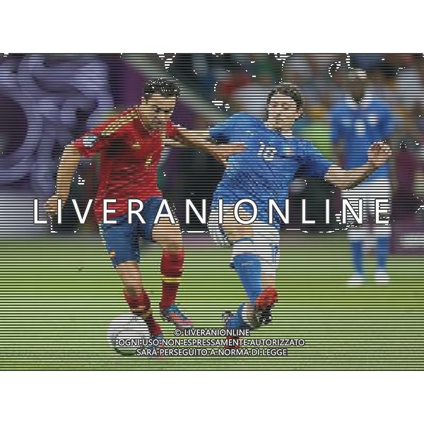 KIJOW STADION OLIMPIJSKI 01.07.2012 EURO 2012 PILKA NOZNA FINAL MISTRZOSTW EUROPY HISZPANIA WLOCHY NZ XAVI HERNANDEZ SPA RICCARDO MONTOLIVO ITA FOT MICHAL NOWAK / NEWSPIX.PL KYIV OLYMPIC STADIUM 01.07.2012 FOOTBALL SOCCER EURO 2012 FINAL OF UEFA EUROPEAN FOOTBALL CHAMPIONSHIP SPAIN - ITALY XAVI HERNANDEZ SPA RICCARDO MONTOLIVO ITA MICHAL NOWAK / NEWSPIX.PL --- Newspix.pl SPAGNA ITALIA FINALE EUROPEI 2012 - AG ALDO LIVERANI SAS - ITALY ONLY - *** Local Caption *** .