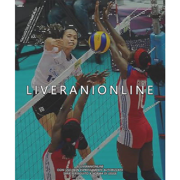 (120701) -- NINGBO, July 1, 2012 () -- A. Wilavan (L) of Thailand spikes the ball during the 5th round match against Cuba at the FIVB Volleyball World Grand Prix in Ningbo, east China\'s Zhejiang Province, July 1, 2012. Thailand won 3-0. (/Xu Yu) ©photoshot/AGENZIA ALDO LIVERANI SAS - ITALY ONLY: Cuba - Thailandia partita Volley del 5¡ turno pallavolo FIVB World Grand Prix