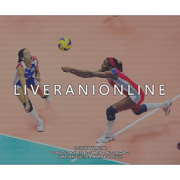 (120701) -- NINGBO, July 1, 2012 () -- Abel Ana Lidia Cleger (R) of Cuba saves the ball during the 5th round match against Thailand at the FIVB Volleyball World Grand Prix in Ningbo, east China\'s Zhejiang Province, July 1, 2012. Thailand won 3-0. (/Xu Yu) ©photoshot/AGENZIA ALDO LIVERANI SAS - ITALY ONLY: Cuba - Thailandia partita Volley del 5¡ turno pallavolo FIVB World Grand Prix