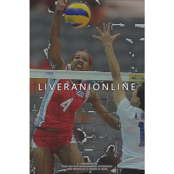 (120701) -- NINGBO, July 1, 2012 () -- Palacios (L) of Cuba spikes the ball during the 5th round match against Thailand at the FIVB Volleyball World Grand Prix in Ningbo, east China\'s Zhejiang Province, July 1, 2012. Thailand won 3-0. (/Ju Huanzong) ©photoshot/AGENZIA ALDO LIVERANI SAS - ITALY ONLY: Cuba - Thailandia partita Volley del 5¡ turno pallavolo FIVB World Grand Prix
