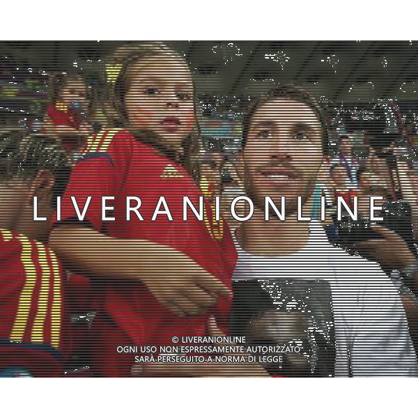 KIJOW STADION OLIMPIJSKI 01.07.2012 EURO 2012 PILKA NOZNA FINAL MISTRZOSTW EUROPY HISZPANIA WLOCHY NZ HISZPANIA RADOSC ZWYCIESTWO MISTRZOSTWO MISTRZ EUROPY FETA SERGIO RAMOS SPA Z DZIECKIEM FOT MICHAL NOWAK / NEWSPIX.PL KYIV OLYMPIC STADIUM 01.07.2012 FOOTBALL SOCCER EURO 2012 FINAL OF UEFA EUROPEAN FOOTBALL CHAMPIONSHIP SPAIN - ITALY SPANISH PLAYERS ARE CELEBRATING AS THEY WON OVER ITALY. SPAIN BECAME EUROPEAN CHAMPIONS SERGIO RAMOS SPA WITH DAUGHTER MICHAL NOWAK / NEWSPIX.PL --- Newspix.pl /EUROPEO 2012 ITALIA SPAGNA FINALE - AG ALDO LIVERANI SAS - ITALY ONLY - *** Local Caption *** www.newspix.pl mail us: info@newspix.pl call us: 0048 022 23 22 222 --- Polish Picture Agency by Ringier Axel Springer Poland .