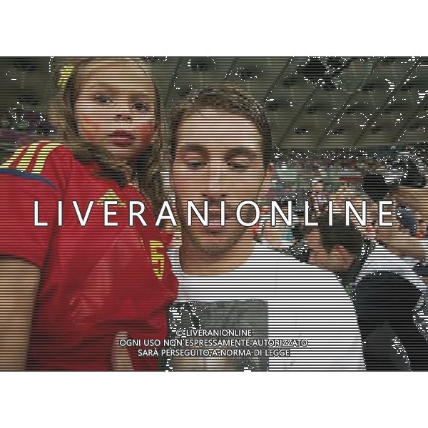 KIJOW STADION OLIMPIJSKI 01.07.2012 EURO 2012 PILKA NOZNA FINAL MISTRZOSTW EUROPY HISZPANIA WLOCHY NZ HISZPANIA RADOSC ZWYCIESTWO MISTRZOSTWO MISTRZ EUROPY FETA SERGIO RAMOS SPA Z DZIECKIEM FOT MICHAL NOWAK / NEWSPIX.PL KYIV OLYMPIC STADIUM 01.07.2012 FOOTBALL SOCCER EURO 2012 FINAL OF UEFA EUROPEAN FOOTBALL CHAMPIONSHIP SPAIN - ITALY SPANISH PLAYERS ARE CELEBRATING AS THEY WON OVER ITALY. SPAIN BECAME EUROPEAN CHAMPIONS SERGIO RAMOS SPA WITH DAUGHTER MICHAL NOWAK / NEWSPIX.PL --- Newspix.pl /EUROPEO 2012 ITALIA SPAGNA FINALE - AG ALDO LIVERANI SAS - ITALY ONLY - *** Local Caption *** www.newspix.pl mail us: info@newspix.pl call us: 0048 022 23 22 222 --- Polish Picture Agency by Ringier Axel Springer Poland .