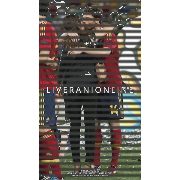 KIJOW STADION OLIMPIJSKI 01.07.2012 EURO 2012 PILKA NOZNA FINAL MISTRZOSTW EUROPY HISZPANIA WLOCHY NZ HISZPANIA RADOSC ZWYCIESTWO MISTRZOSTWO MISTRZ EUROPY FETA XABI ALONSO SPA Z ZONA FOT MICHAL NOWAK / NEWSPIX.PL KYIV OLYMPIC STADIUM 01.07.2012 FOOTBALL SOCCER EURO 2012 FINAL OF UEFA EUROPEAN FOOTBALL CHAMPIONSHIP SPAIN - ITALY SPANISH PLAYERS ARE CELEBRATING AS THEY WON OVER ITALY. SPAIN BECAME EUROPEAN CHAMPIONS XABI ALONSO SPA WITH WIFE MICHAL NOWAK / NEWSPIX.PL --- Newspix.pl /EUROPEO 2012 ITALIA SPAGNA FINALE - AG ALDO LIVERANI SAS - ITALY ONLY - *** Local Caption *** www.newspix.pl mail us: info@newspix.pl call us: 0048 022 23 22 222 --- Polish Picture Agency by Ringier Axel Springer Poland .