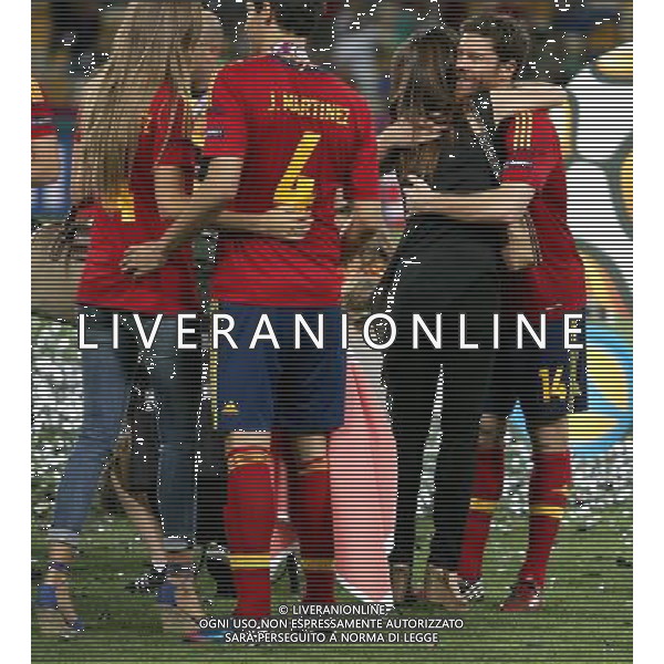 KIJOW STADION OLIMPIJSKI 01.07.2012 EURO 2012 PILKA NOZNA FINAL MISTRZOSTW EUROPY HISZPANIA WLOCHY NZ HISZPANIA RADOSC ZWYCIESTWO MISTRZOSTWO MISTRZ EUROPY FETA XABI ALONSO SPA Z ZONA FOT MICHAL NOWAK / NEWSPIX.PL KYIV OLYMPIC STADIUM 01.07.2012 FOOTBALL SOCCER EURO 2012 FINAL OF UEFA EUROPEAN FOOTBALL CHAMPIONSHIP SPAIN - ITALY SPANISH PLAYERS ARE CELEBRATING AS THEY WON OVER ITALY. SPAIN BECAME EUROPEAN CHAMPIONS XABI ALONSO SPA WITH WIFE MICHAL NOWAK / NEWSPIX.PL --- Newspix.pl /EUROPEO 2012 ITALIA SPAGNA FINALE - AG ALDO LIVERANI SAS - ITALY ONLY - *** Local Caption *** www.newspix.pl mail us: info@newspix.pl call us: 0048 022 23 22 222 --- Polish Picture Agency by Ringier Axel Springer Poland .