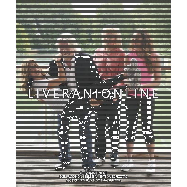 Zoe Hardman, Richard Branson, Lydia Bright and Michelle Heaton at a photocall to reveal Richard Branson\'s celebrity team taking part in this year\'s Virgin Active London Triathlon at Virgin Active Chiswick Riverside on July 3, 2012 in London, England. /PHOTOSHOT/AG ALDO LIVERANI - ITALY ONLY -