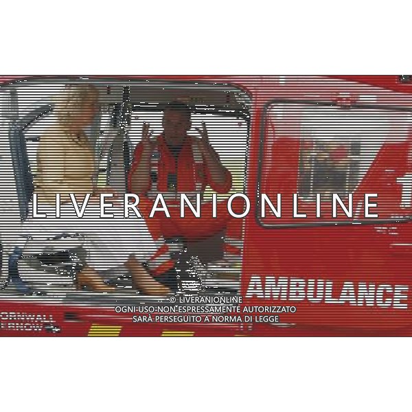 The Duchess of Cornwall sits inside a helicopter with paramedic Steve Garvey during a visit to the Cornwall Air Ambulance Trust, where as Patron, she officially opened their new headquarters at Newquay Airport, Cornwall. PHOTOSHOT/AG ALDO LIVERANI SAS - ITALY ONLY -