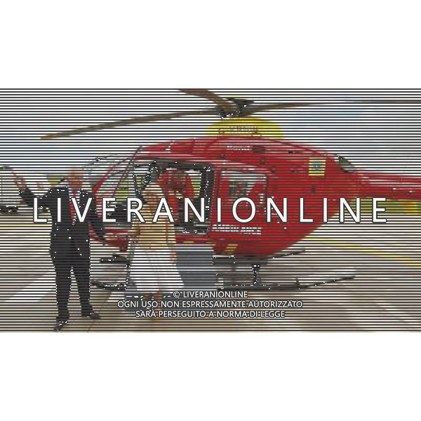 The Duchess of Cornwall is helped from the helicopter by trustee Ian Brackenbury (left) during a visit to the Cornwall Air Ambulance Trust, where as Patron, she officially opened their new headquarters at Newquay Airport, Cornwall. PHOTOSHOT/AG ALDO LIVERANI SAS - ITALY ONLY -