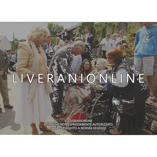 The Prince of Wales and the Duchess of Cornwall meet 105-year-old Mary Fox during a visit to the Old Duchy Palace in Lostwithiel, Cornwall. Mrs Fox is the grandmother of actor Edward Fox and was a friend of Daphne Du Maurier with whom she shared a birthday. PHOTOSHOT/AG ALDO LIVERANI SAS - ITALY ONLY -