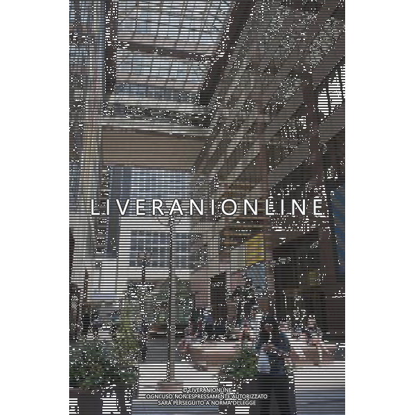 Six and one-half Avenue is seen in Midtown Manhattan in New York on Friday, July 6, 2012. The new street is actually a series of interconnected pedestrian arcades, mid-block between Sixth and Seventh Avenues, running from West 51 Street to West 57 Street. The city is in the process of installing signage and pedestrian crossings. Up to 1200 people an hour use the connected arcades to travel through midtown. The arcades are privately owned public spaces that are provided by the buildings\' owners in exchange for zoning variances. (å Richard B. Levine) /PHOTOSHOT/AG ALDO LIVERANI SAS - ITALY ONLY -