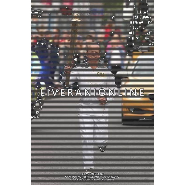 Torchbearer 001 Michael Stroud carries the Olympic Flame on the Torch Relay leg through Southampton. PHOTOSHOT/AG ALDO LIVERANI SAS - ITALY ONLY -