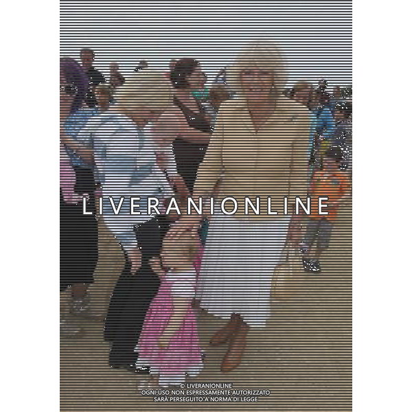 SARK, UNITED KINGDOM - JULY 20: Camilla, Duchess of Cornwall meets children as she arrives on the Island of Sark on July 20, 2012 in Sark, United Kingdom. The Prince of Wales and the Duchess of Cornwall are in Sark as part of a Diamond Jubilee visit to the Channel Islands taking in Jersey, Guernsey and Sark ©photoshot/AG ALDO LIVERANI SAS - ITALY ONLY -
