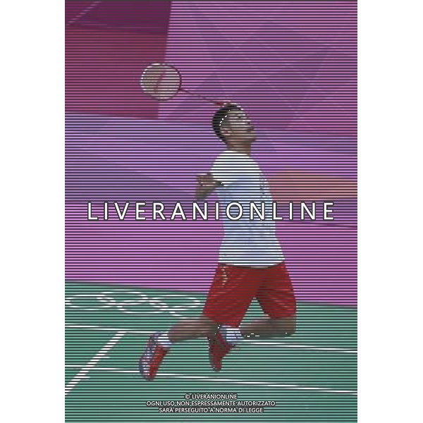 (120724) -- LONDON, July 24, 2012 () -- Chinese badminton player Lin Dan returns the ball during a training session at Wembley Arena in London, Britain, July 24, 2012. The 2012 London Olympic Games begins on July 27. (/Chen Xiaowei)(zgp) ©photoshot/AGENZIA ALDO LIVERANI SAS - ITALY ONLY - Allenamenti, preparativi allo Stadio Olimpico prima della prova generale della Cerimonia d\'Apertura dei Giochi Olimpici delle Olimpiadi Londra 2012, a Londra, Gran Bretagna, 23 luglio 2012 che inizieranno il 27 luglio.