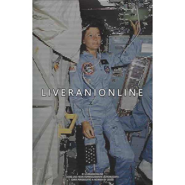 Astronaut Sally K. Ride, STS-7 mission specialist, STS-7 mission specialist, stands in the mid deck of the orbiting Space Shuttle Challenger near one of the experiment with which she has devoted a great deal of time at an unknown location, 21ÊJune 1983. The continuous flow electrophoresis system (CFES) experiment, about the size of a household refrigerator, stands nearby. One of her fellow crewmembers moves partially out of frame in the background. The tube on her face is part of a communications system linking Dr. Ride to ground controllers in Houston. Dr. Ride passed away due to Pancreatic Cancer on 23 July 2012. ©photoshot/AGENZIA ALDO LIVERANI SAS - ITALY ONLY - Sally Kristen Ride (Los Angeles, 26 maggio 1951 Ð La Jolla, 23 luglio 2012) e\' stata la prima astronauta statunitense a raggiungere il 18 giugno 1983 lo spazio a bordo dello shuttle \'Challenger\'