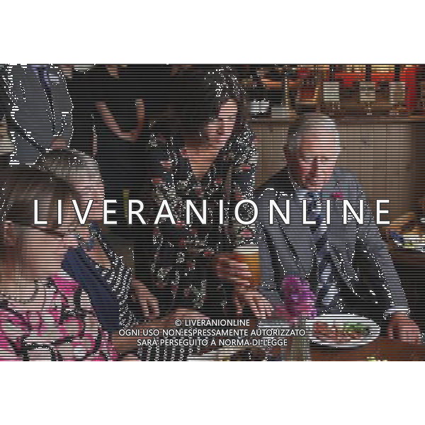 Britain\'s Prince Charles, right, is seen at the Ship Inn at Low Newton by the Sea, England, Tuesday, July 24, 2012. (AP Photo/Scott Heppell, Pool) ©photoshot/Agenzia Aldo Liverani Sas - ITALY ONLY - REALI INGLESI: Il Principe Carlo d\'inghilterra durante la visita nel nord-est 23 luglio 2012.