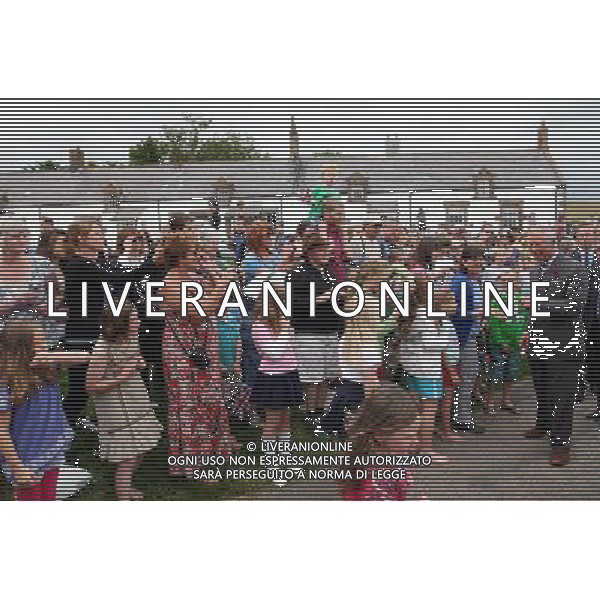 Britain\'s Prince Charles meets resident\'s of Low Newton by the Sea, England, Tuesday, July 24, 2012, (AP Photo/Scott Heppell, Pool) ©photoshot/Agenzia Aldo Liverani Sas - ITALY ONLY - REALI INGLESI: Il Principe Carlo d\'inghilterra durante la visita nel nord-est 23 luglio 2012.