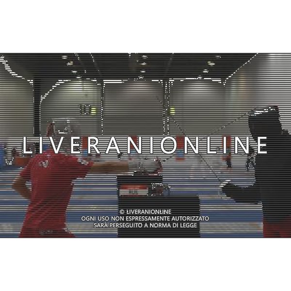 (120724) -- LONDON, July 24, 2012 () -- A Russian fencer (L) practises with his coach at the fencing venue in ExCel in London, Britain, July 24, 2012. (/Zeng Yi)(zgp) ©photoshot/Agenzia Aldo Liverani Sas - ITALY ONLY - Allenamenti, preparativi dei Giochi Olimpici delle Olimpiadi Londra 2012, a Londra, Gran Bretagna, 24 luglio 2012 che inizieranno il 27 luglio.