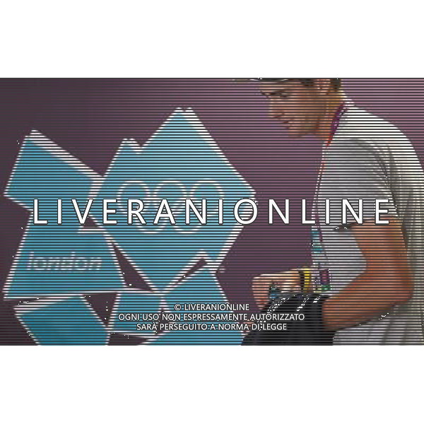 (120724) -- LONDON, July 24, 2012 () -- John Isner of the United States arrives before a press conference at the Main Media Center in London, Britain, on July 24, 2012. (/Li Ming) ©photoshot/Agenzia Aldo Liverani Sas - ITALY ONLY - Allenamenti, preparativi dei Giochi Olimpici delle Olimpiadi Londra 2012, a Londra, Gran Bretagna, 24 luglio 2012 che inizieranno il 27 luglio.