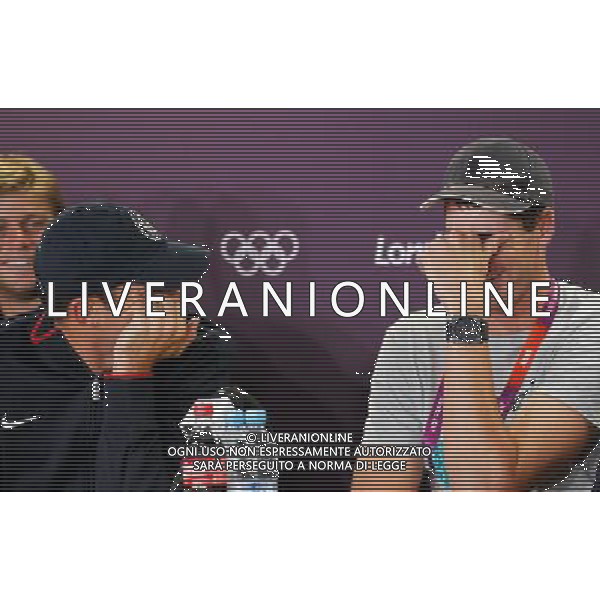 (120724) -- LONDON, July 24, 2012 () -- John Isner (R) and Andy Roddick of the United States react during a press conference at the Main Media Center in London, Britain, on July 24, 2012. (/Li Ming) ©photoshot/Agenzia Aldo Liverani Sas - ITALY ONLY - Allenamenti, preparativi dei Giochi Olimpici delle Olimpiadi Londra 2012, a Londra, Gran Bretagna, 24 luglio 2012 che inizieranno il 27 luglio.
