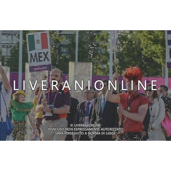 (120724) -- LONDON, July 24, 2012 () -- The Mexican delegation to the 2012 London Olympic Games holds flag-raising ceremony at the Olympic Village in London, Britain, July 24, 2012. (/Yang Lei) ©photoshot/Agenzia Aldo Liverani Sas - ITALY ONLY - Allenamenti, preparativi dei Giochi Olimpici delle Olimpiadi Londra 2012, a Londra, Gran Bretagna, 24 luglio 2012 che inizieranno il 27 luglio.