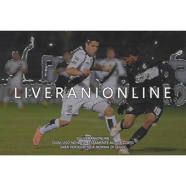 (120725) -- MONTEVIDEO, July 25, 2012 () -- Uruguay\'s Danubio Leonardo Melazzi (L) vies for the ball with Salustiano Candia (R) of Paraguay\'s Olimpia, during a 2012 Copa Sudamericana soccer match in Montevideo, capital of Uruguay, on July 24, 2012. (/Nicolas Celaya) (nc) (sp) ©PHOTOSHOT/Agenzia Aldo Liverani Sas - ITALY ONLY - Danubio Uruguay - Olimpia Paraguay partita di Copa Sudamericana di calcio 2012 a Montevideo, capitale dell\'Uruguay, il 24 luglio 2012.