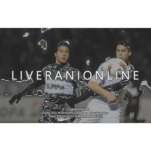 (120725) -- MONTEVIDEO, July 25, 2012 () -- Uruguay\'s Danubio Leonardo Melazzi (R) vies for the ball with Salustiano Candia (L) of Paraguay\'s Olimpia, during a 2012 Copa Sudamericana soccer match in Montevideo, capital of Uruguay, on July 24, 2012. (/Nicolas Celaya) (nc) (sp) ©PHOTOSHOT/Agenzia Aldo Liverani Sas - ITALY ONLY - Danubio Uruguay - Olimpia Paraguay partita di Copa Sudamericana di calcio 2012 a Montevideo, capitale dell\'Uruguay, il 24 luglio 2012.